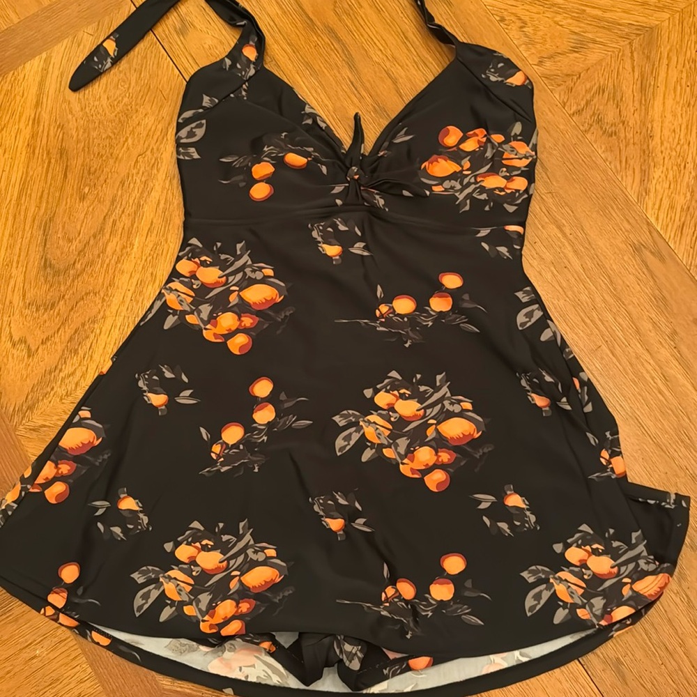 One piece skirt bathing suit. Peach or Cherry pattern.